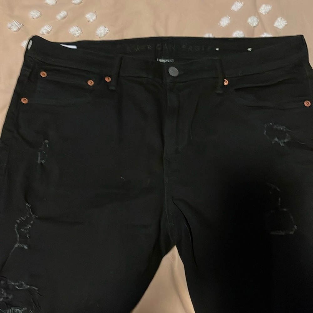 Black ripped AE air flex plus jeans